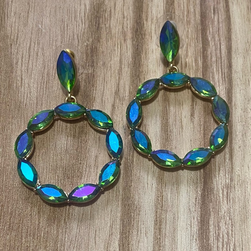 Gold Tone Dangle Earrings.